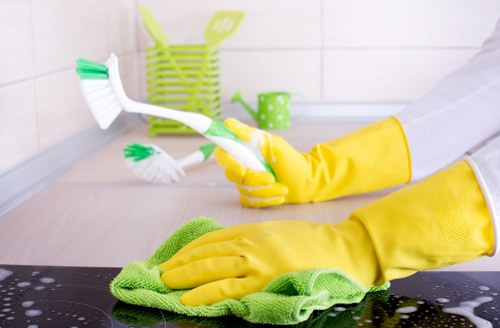 Technician treating a mattress stain during mattress cleaning in Cockfosters